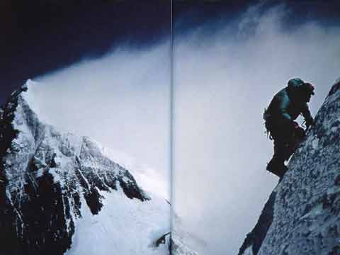 
Rob Hall took this photo of Ed Viesturs approaching the precarious wafer-thin summit of Lhotse on May 16, 1994, with Everest behind - Himalayan Quest: Ed Viesturs on the 8,000-Meter Giants book
